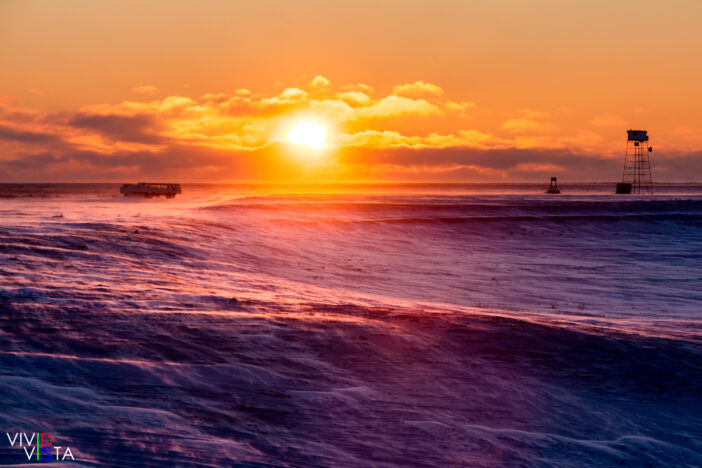 Tundra Buggies at sunset next to a Polar Bear observation tower in Wapusk NP, Manitoba, Canada IMG_1463_vividvista