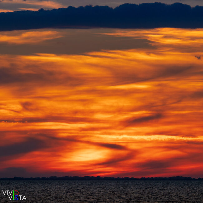 Fiery Sky at sunset over Étang de Vaccarès, Camargue, France